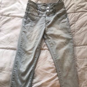 Washed out light blue jeans